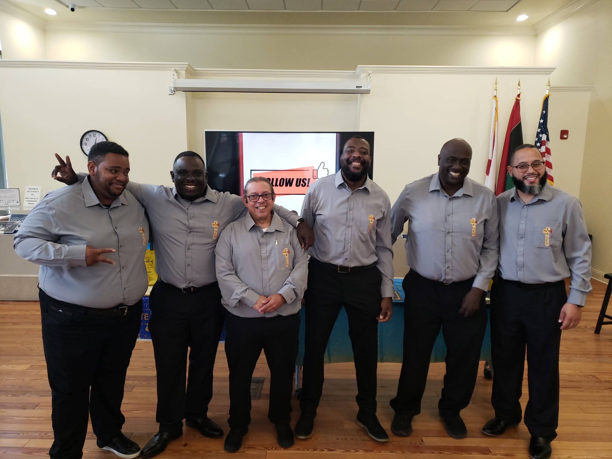 Forged Forward Foundation team standing together in matching shirts