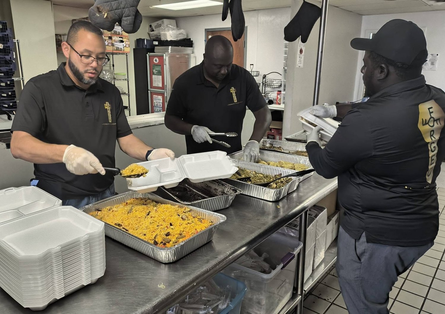 FFF leaders serving meals during outreach