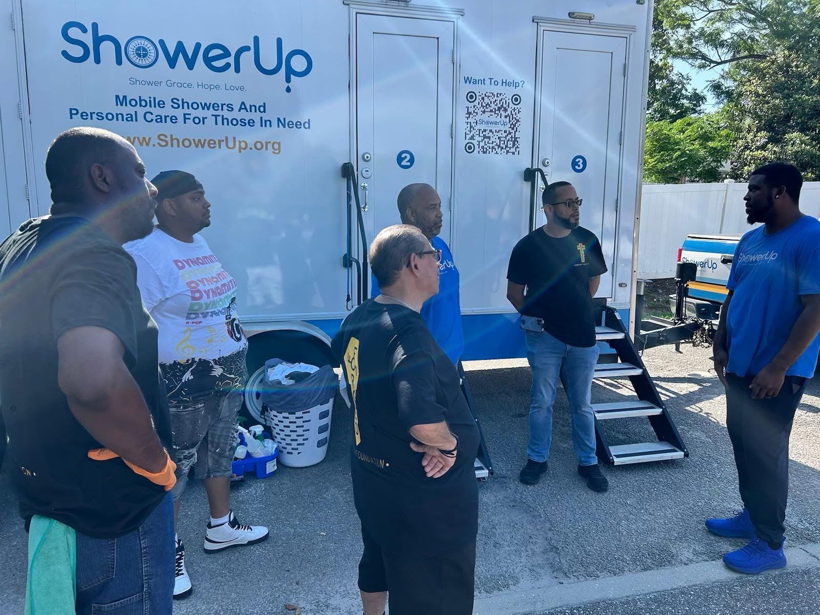 FFF team coordinating with ShowerUp mobile care partners
