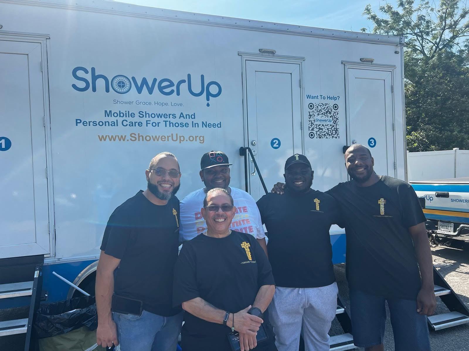 FFF team with ShowerUp community partner