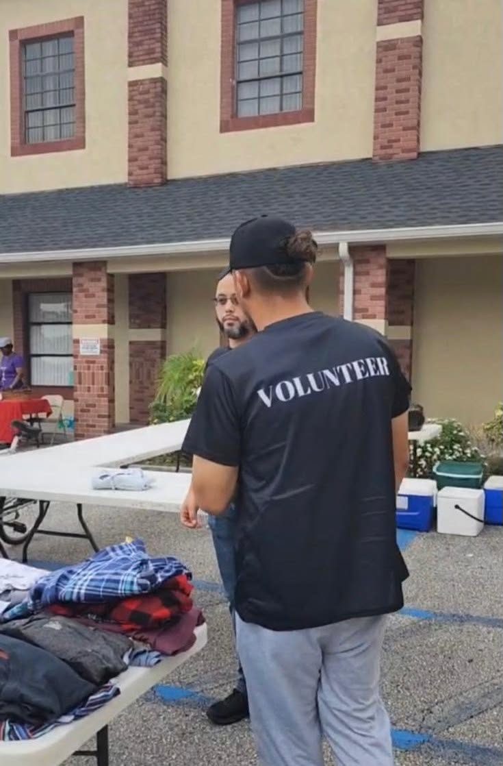 FFF volunteer at clothing outreach